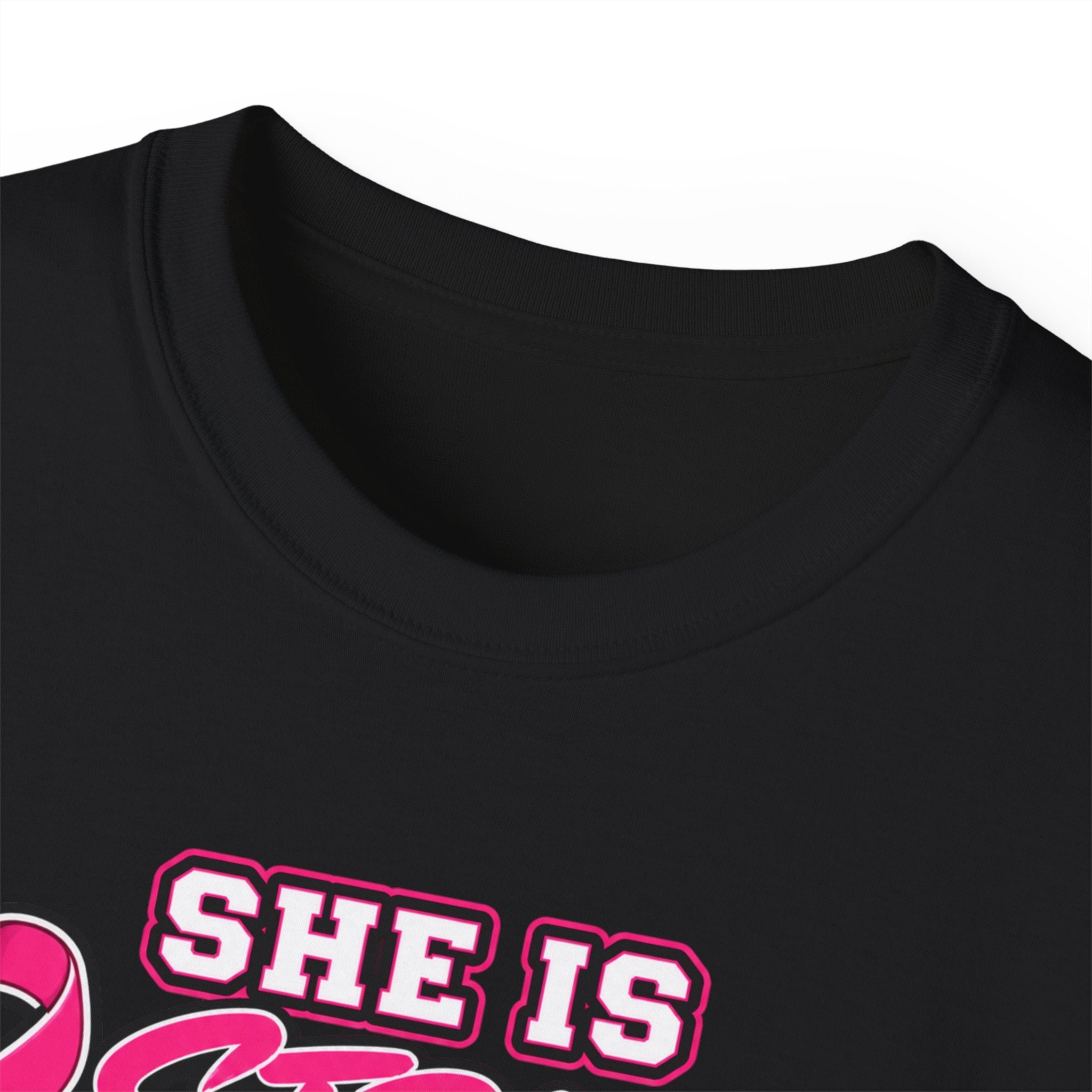 Katie Strong — "She is Strong" Breast Cancer Awareness Tee