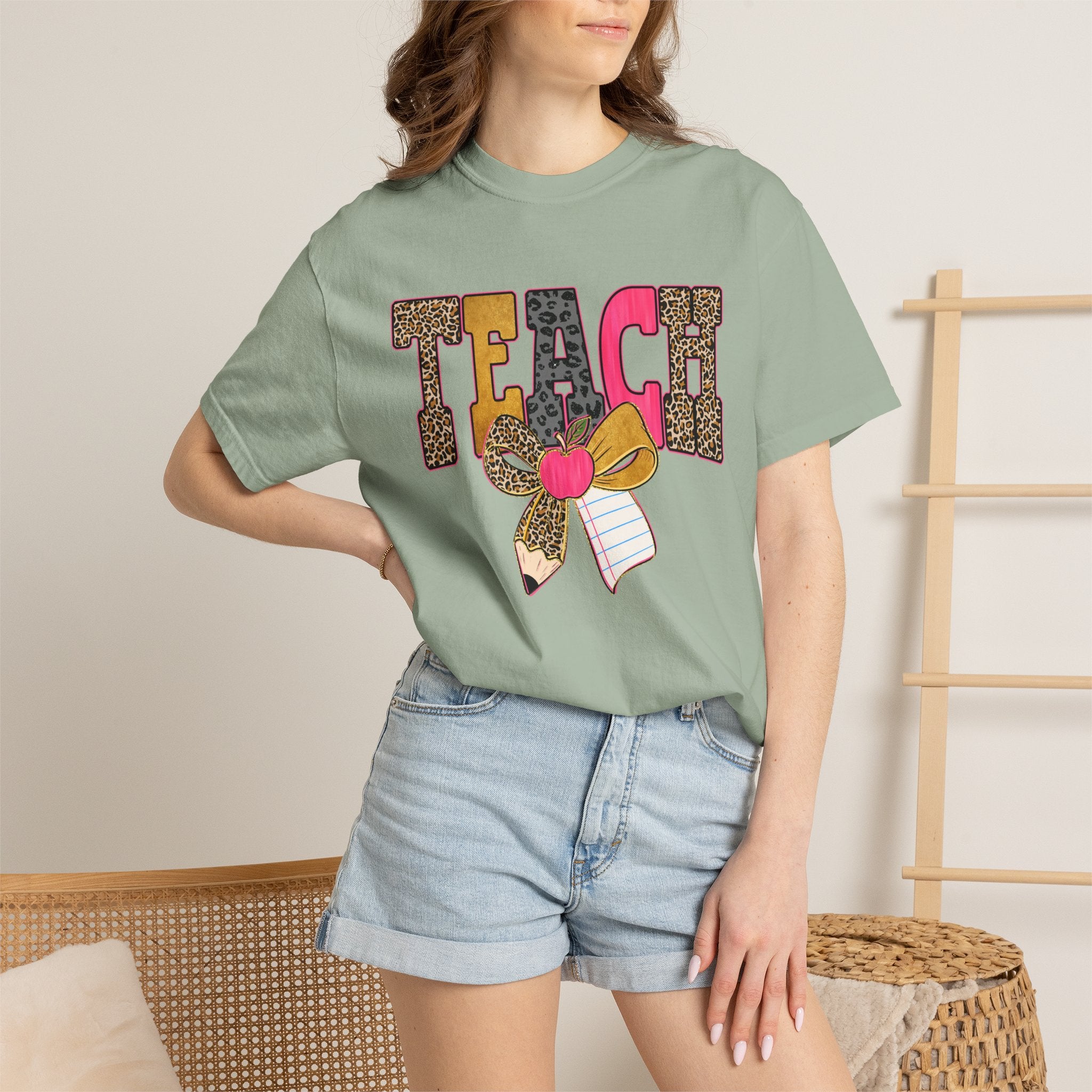 Teacher Graphic Tee — 'TEACH' Leopard Print Pencil Bow Design